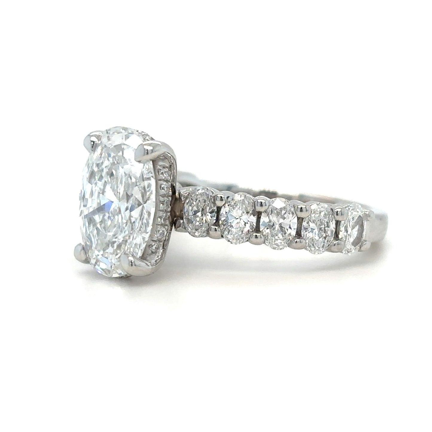 Lexie – Oval Solitaire with Hidden Halo and wide Pavé