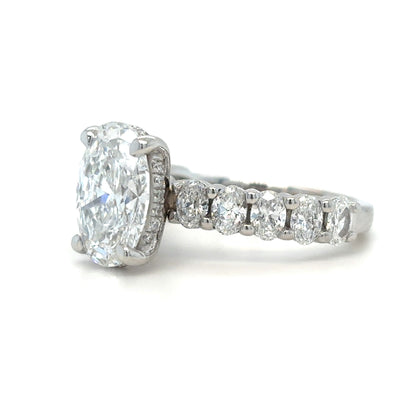 Lexie – Oval Solitaire with Hidden Halo and wide Pavé