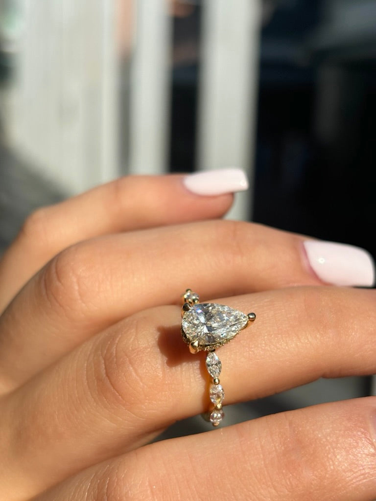 Aline – Pear Solitaire with 3 Marquise Side Stones & Hidden Halo