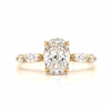 Claire – Oval Solitaire with Marquise and Round Side Stones