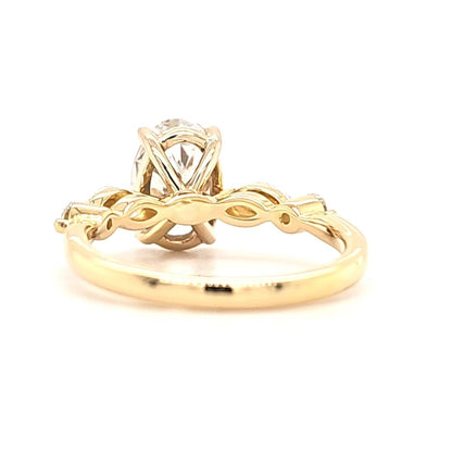 Claire – Oval Solitaire with Marquise and Round Side Stones