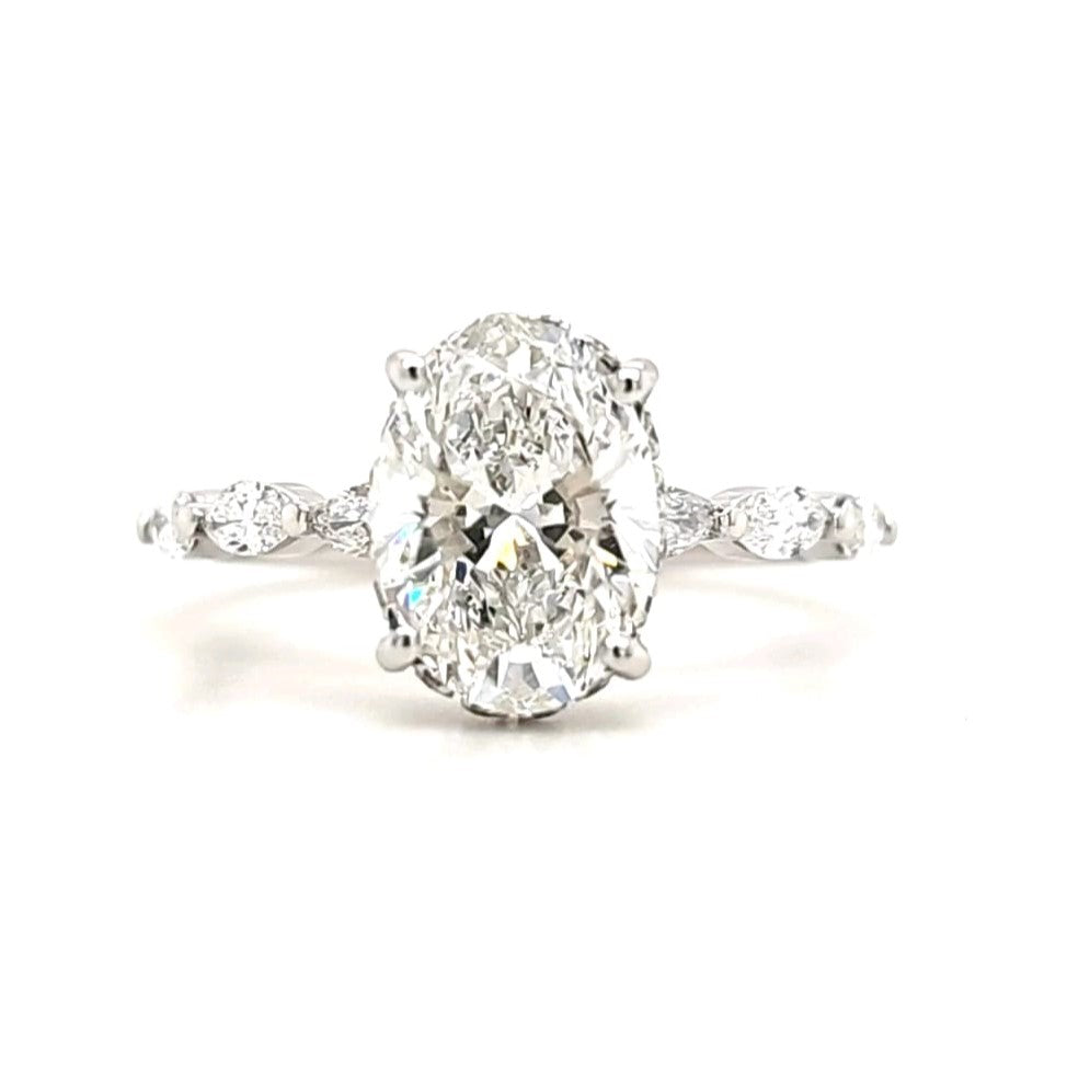 Aurora – Oval Solitaire with Hidden Halo and Marquise Side Stones