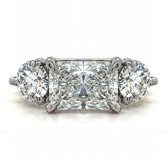 Deborah - Horizontal Radiant with Round Diamonds Trilogy Ring